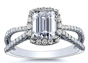 Emerald cut diamond set into a halo setting