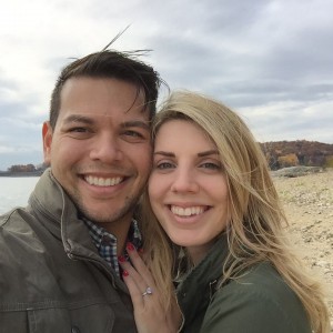 Andy and Christine standing on a beach