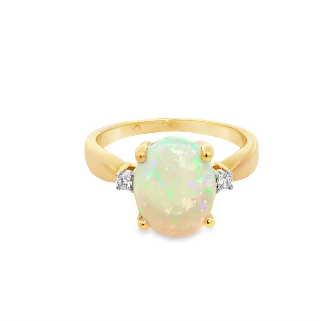 14K Yellow Gold Ring with 1 Oval Opal and Round Diamonds