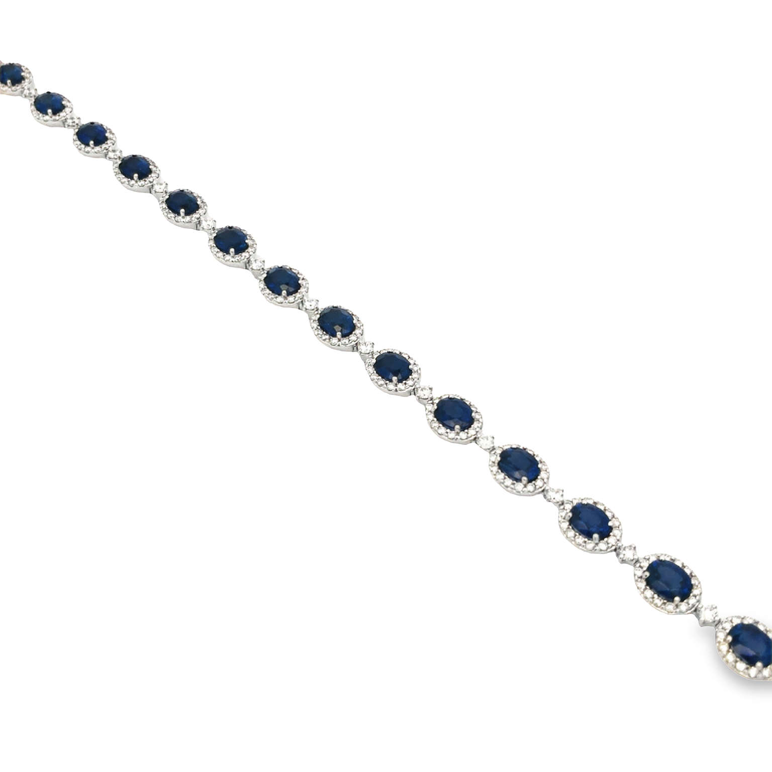 18K White Gold Sapphire and Diamond Bracelet with 17 Oval Sapphires